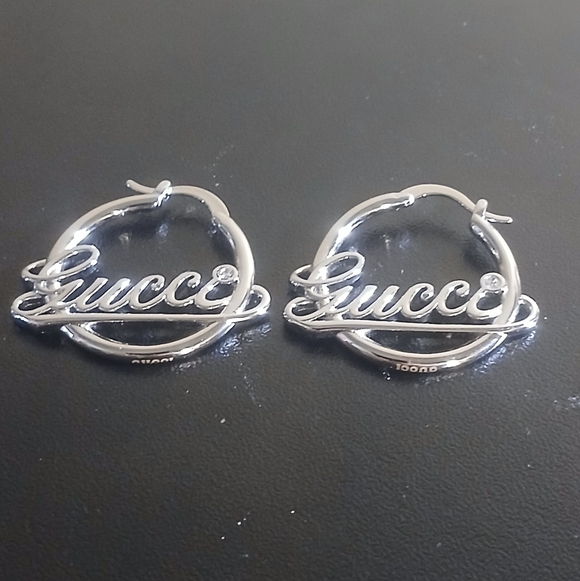 Gucci Silver Cursive Logo Hoop Earrings - Picture 1 of 8